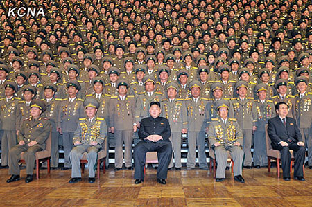 The national meeting of police station chiefs held in Pyongyang on 23 November. Kim Jong-un(Center) and Jang Song-thaek(Rightmost).It is said that the execution of police officers took place after this meeting.(Nov/2013 - PHOTO:KCNA)