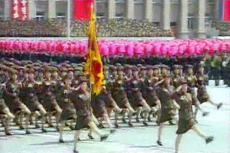 Female troops, presumably a paramilitary unit composed of university students, march at the 60th anniversary "victory day" of Korean War.(July.2013. A screen grab from the North Korean state-run KCTV.)