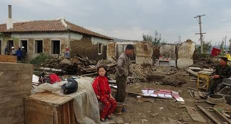 Devastated residents as their home was totally destroyed. Taken on early September: International Federation of Red Cross and Red Crescent Societies