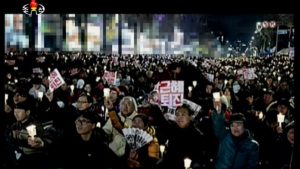 A rally calling for President Park Geun-hye to quit.  Buildings behind are blurred out.(Quoted from Korean Central Television on December 3)