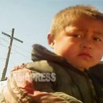 <Photo Report> Kotchebi, the Homeless, Under the Kim Jong-un Regime (PART3)  A toddler–roaming around a city–represents the society.  Kim Jong-un thoughtlessly enters orphanages without taking off shoes.