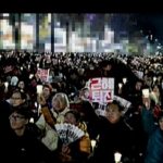 N. Korean TV pixelates the image of the protest against Park Geun-hye. What do they want to hide?