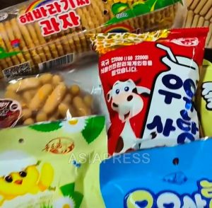 A Large-Scale Price Survey Examining the North Korean Economy (5): Domestic Product Promotion in Clothing, Bags, and Snacks... "The Reality Is Semi-Chinese Products" - Candy and Snacks Are Popular